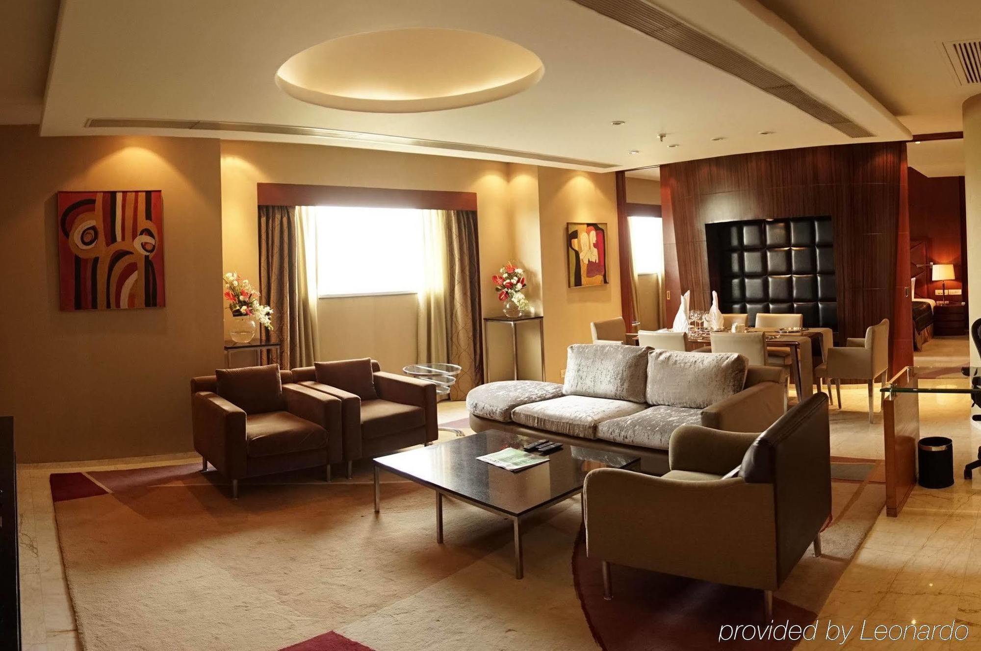 Taj Chandīgarh Exterior foto A living room in a suite at the Ritz-Carlton, Dubai